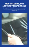 Dark protective film being peeled from a curved surface