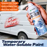 Temporary colour spray can beside a delivery van