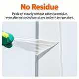 Clear protective film being peeled from a white frame