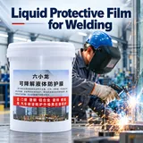 Liquid protective film pail beside a welding scene