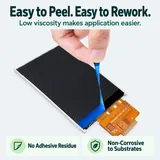 Blue protective coating being peeled from a display edge