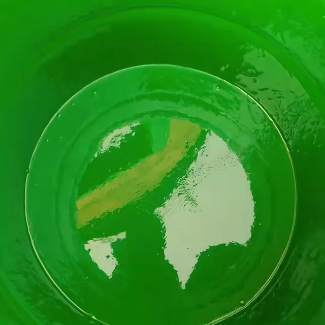 Green glass flake coating inside a container