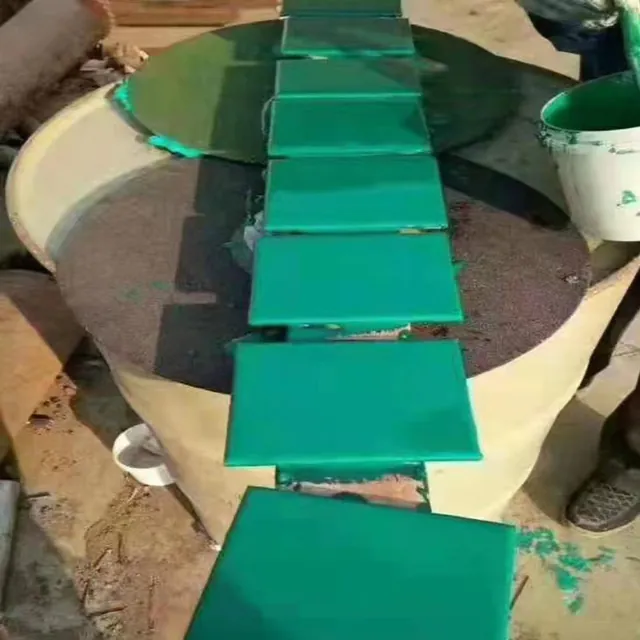 Rectangular coated test panels arranged in a row