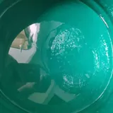 Turquoise coating inside a mixing container