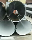 Coating equipment positioned inside steel pipes