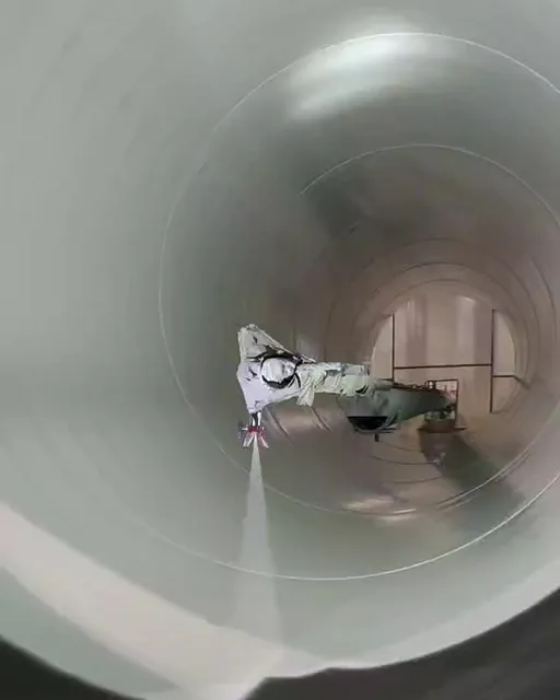 Spray application inside a large pipe