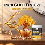 Gold-coloured deer ornament and decorative tree