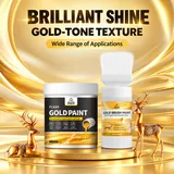 Gold effect paint containers beside decorative objects