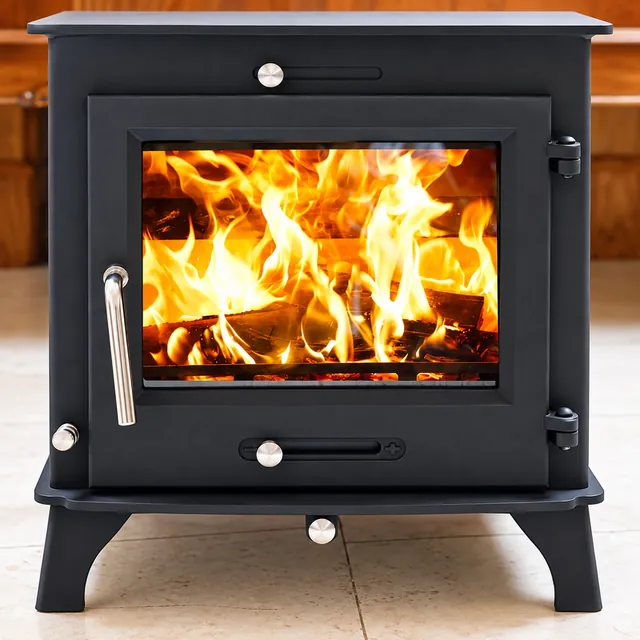 Black wood-burning stove with visible flames