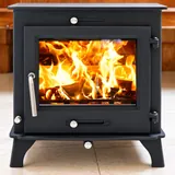 Black wood-burning stove with visible flames